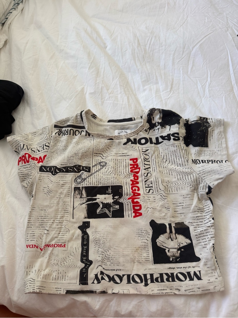 With Jean newspaper tee